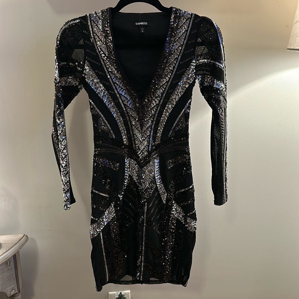 Black sheer dress with sequins.